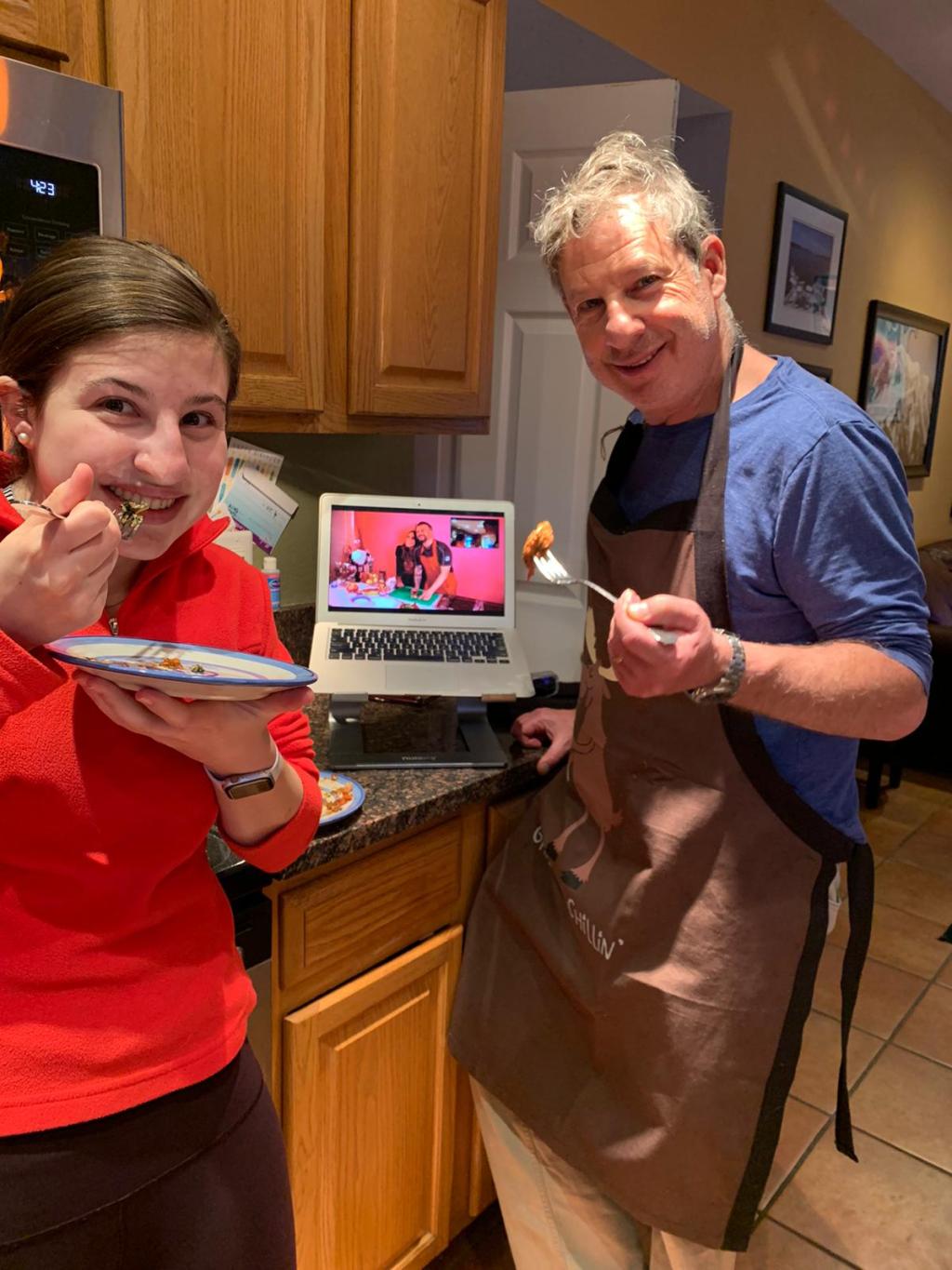 a little boy that is eating some food