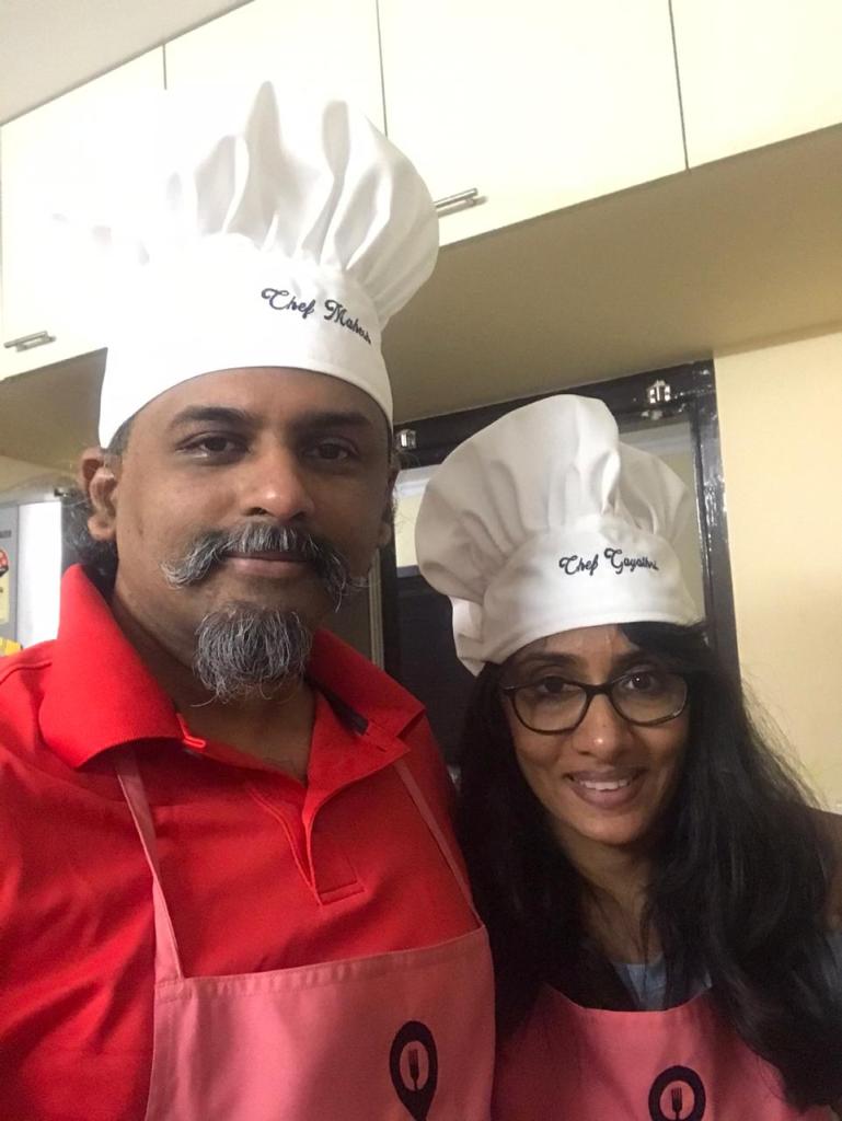 a man and a woman wearing a hat