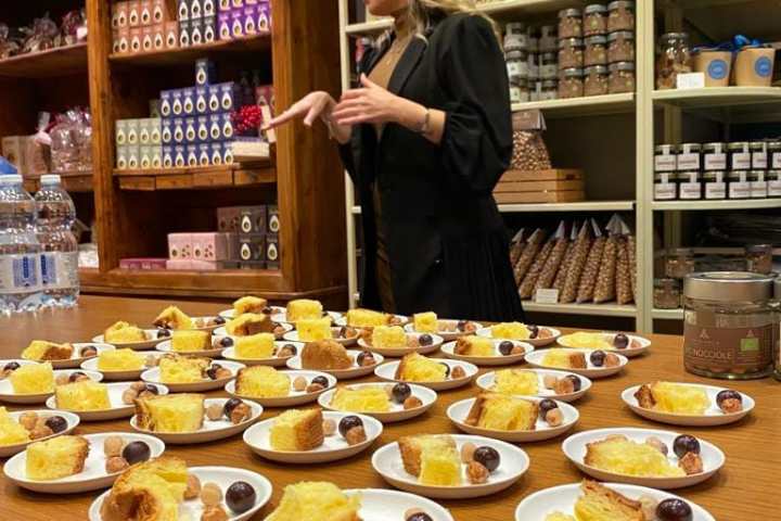 a person sitting at a table full of food