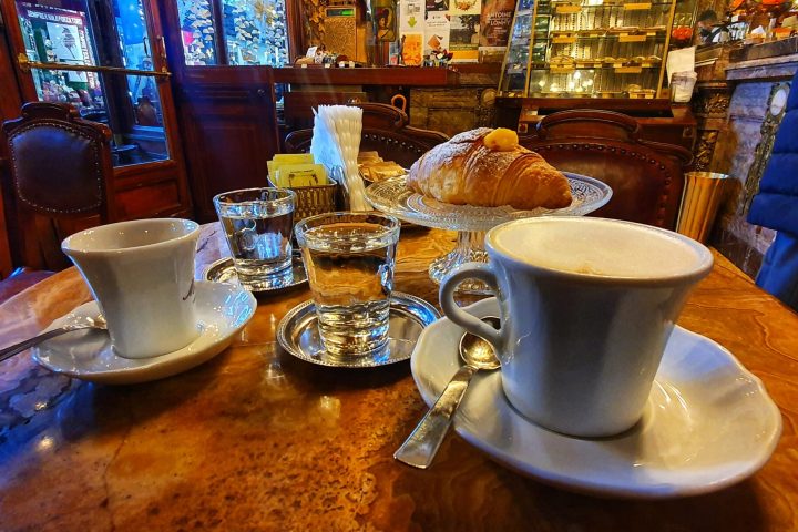 a cup of coffee on a table