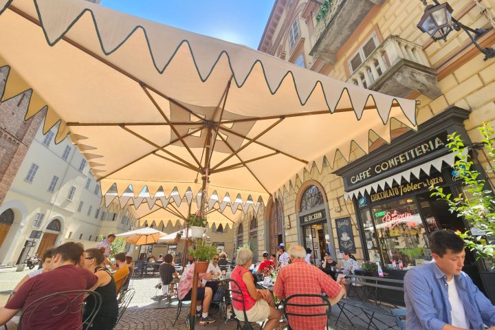 a group of people standing in front of a building