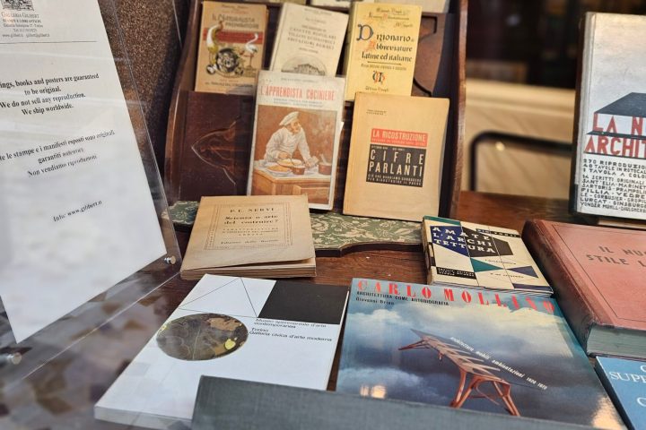 a stack of flyers on a table