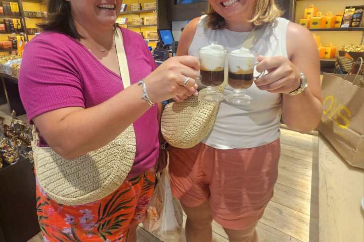 a woman holding a wine glass