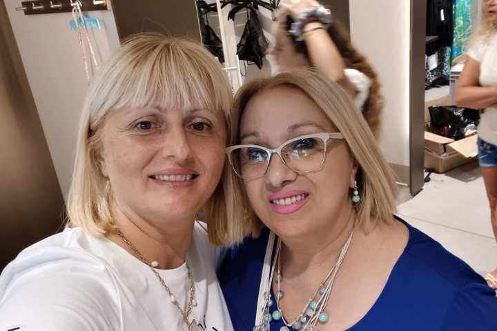 a couple of people posing for the camera