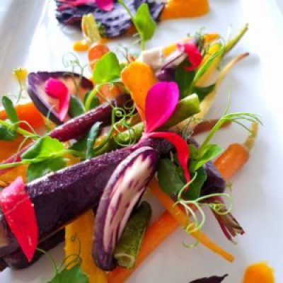 a plate full of colorful flowers