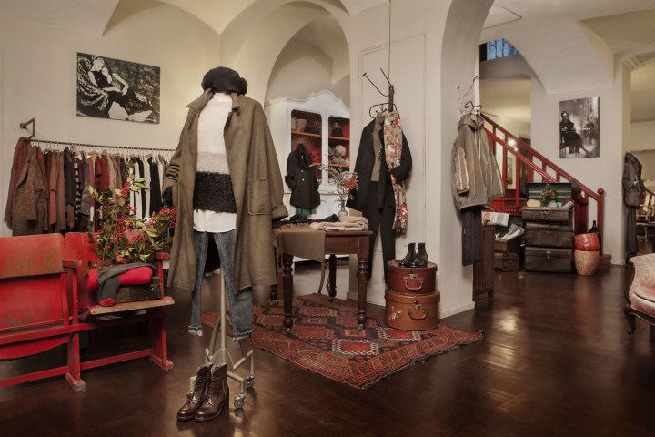 a living room filled with lots of furniture