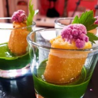 a close up of a glass cup on a table