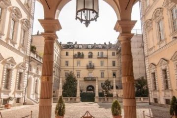 a statue in front of a building