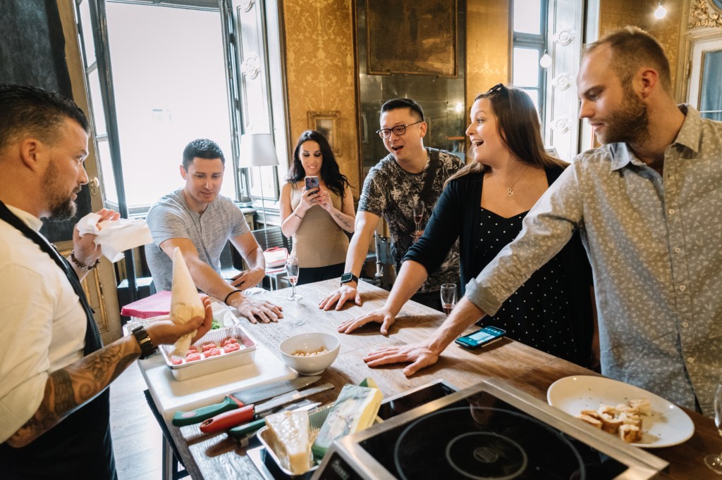 a group of people sitting at a table