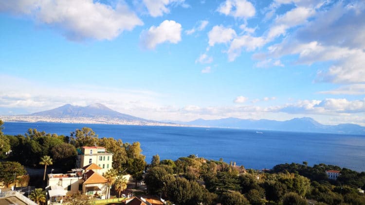 Naples-2-750×422 a view of a city next to a body of water