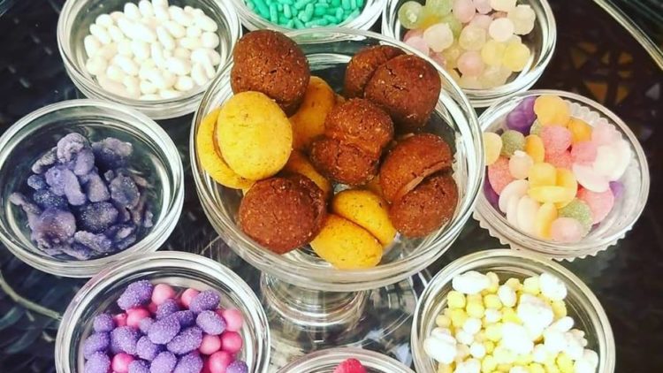 candies-750×422 a plastic container filled with different types of food on a table
