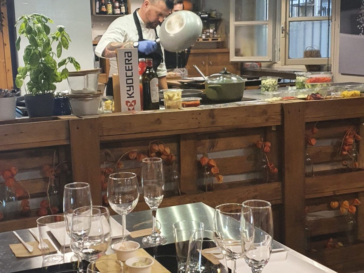 a kitchen with a table in a restaurant