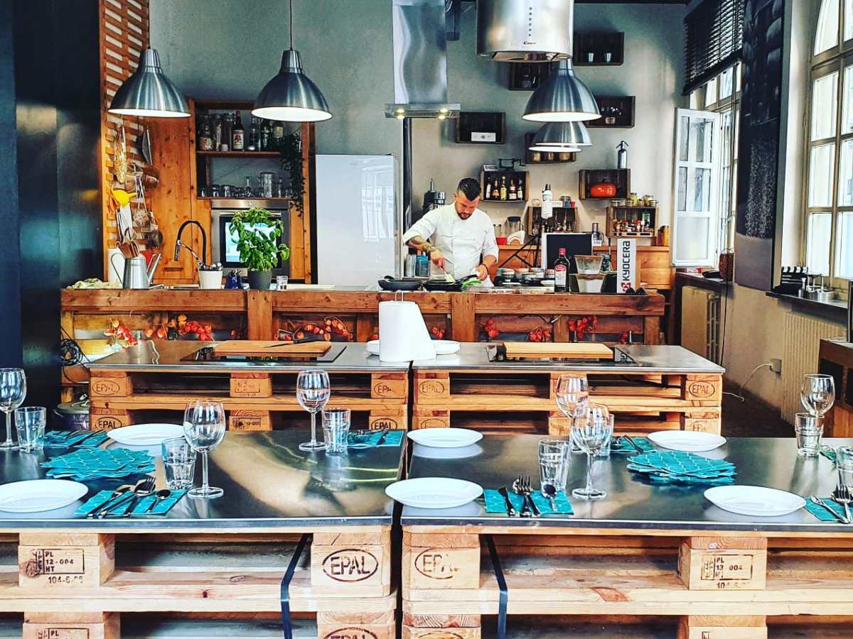 a room filled with furniture and vase on a table