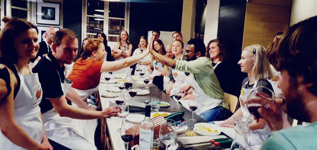 a group of people sitting at a table