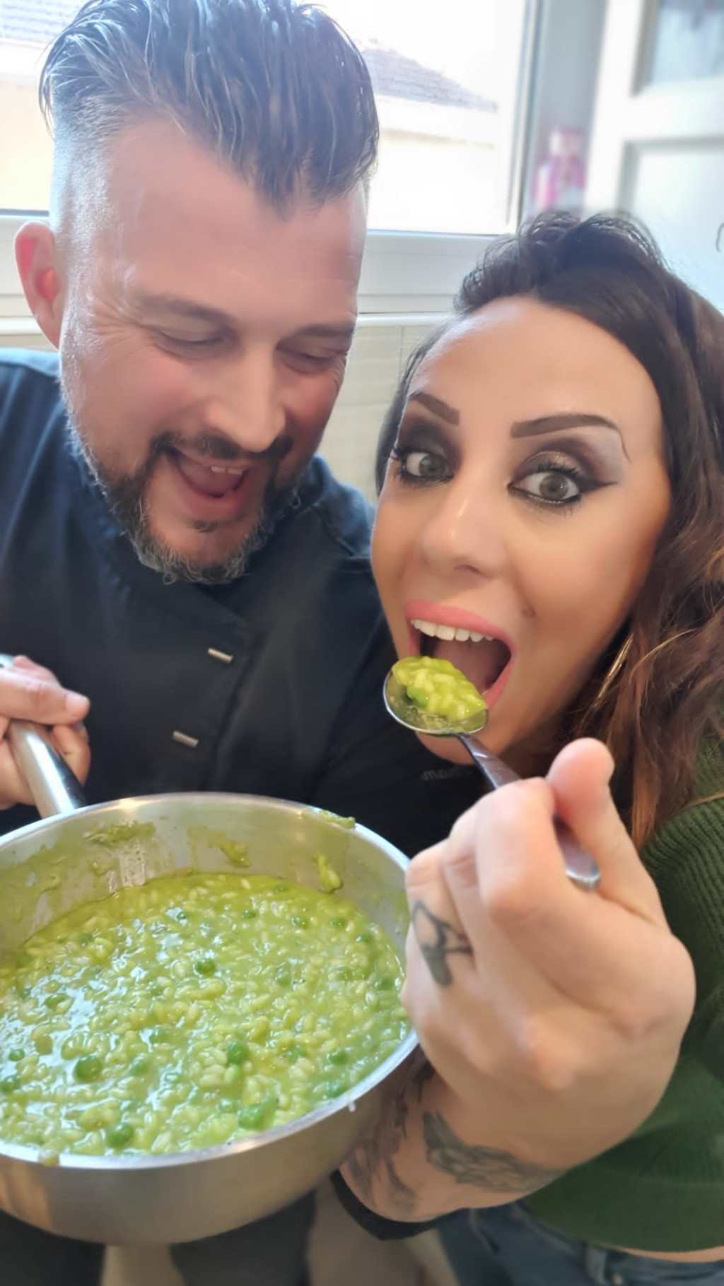 a woman holding a plate of food
