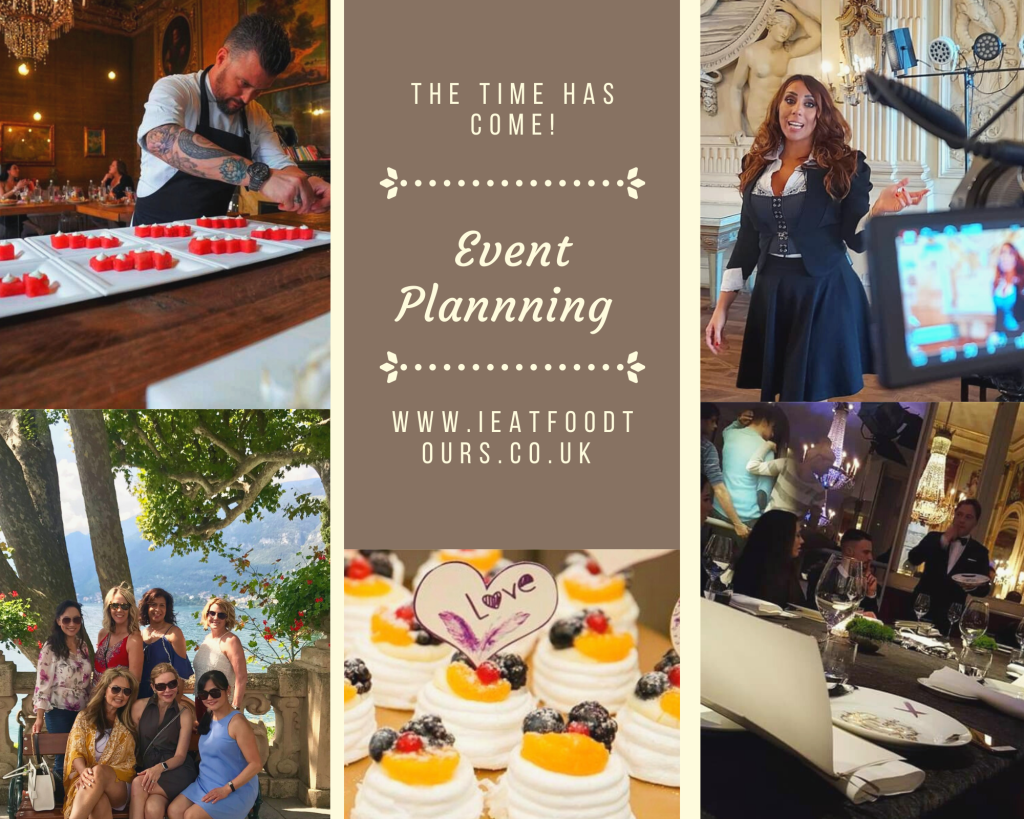 a group of people sitting at a table with a cake