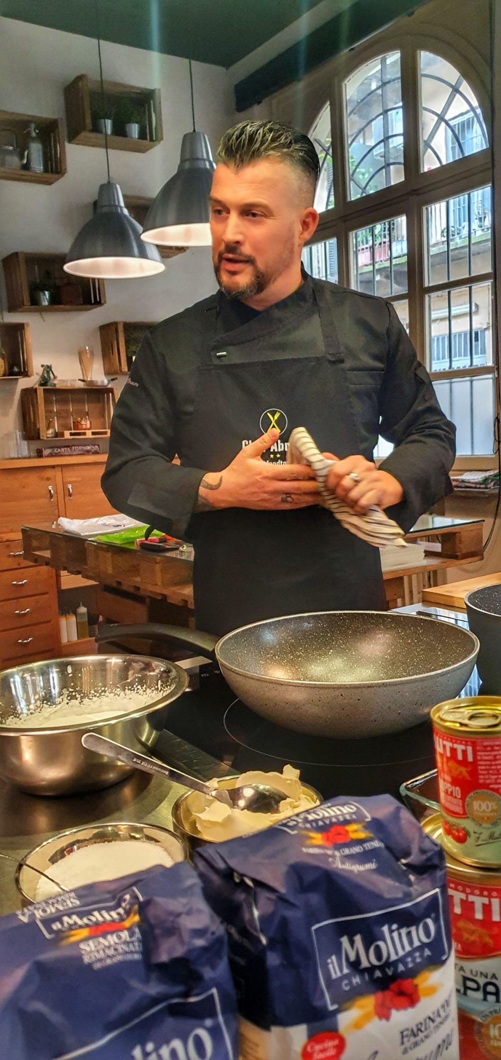 a person sitting at a table with food