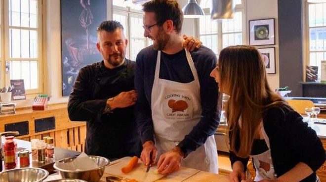 a person cooking in a kitchen preparing food