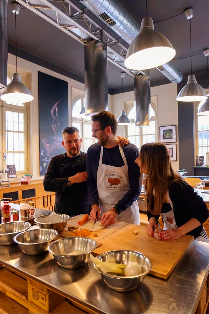 a person cooking in a kitchen preparing food
