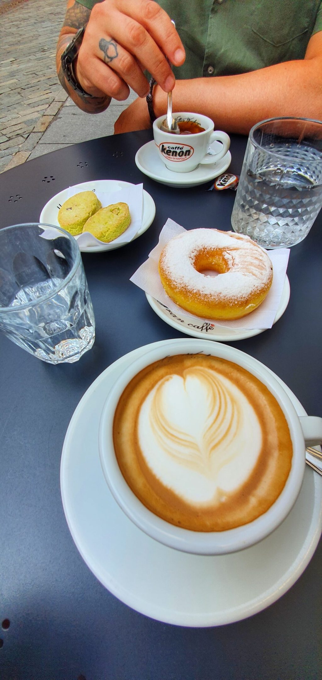a plate of food and a cup of coffee