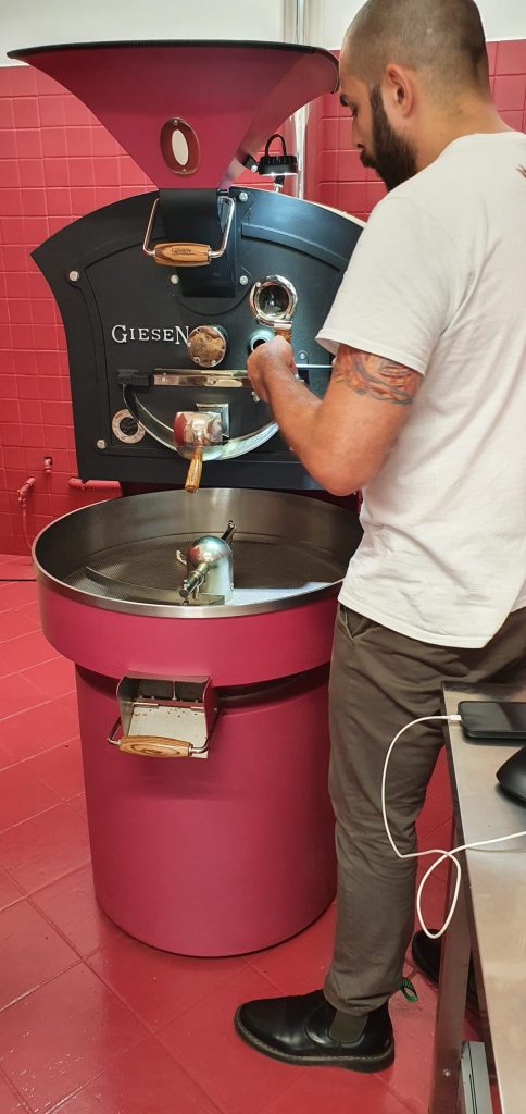 a man standing in front of a stove