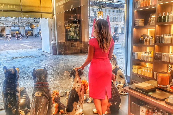 a person standing in front of a store