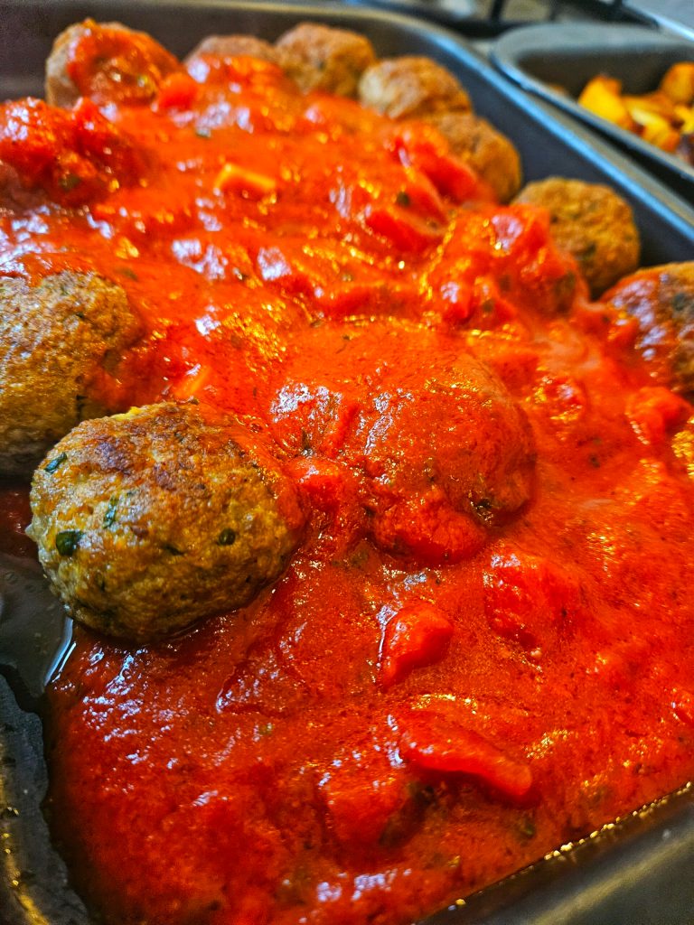 a close up of food, meat and sauce
