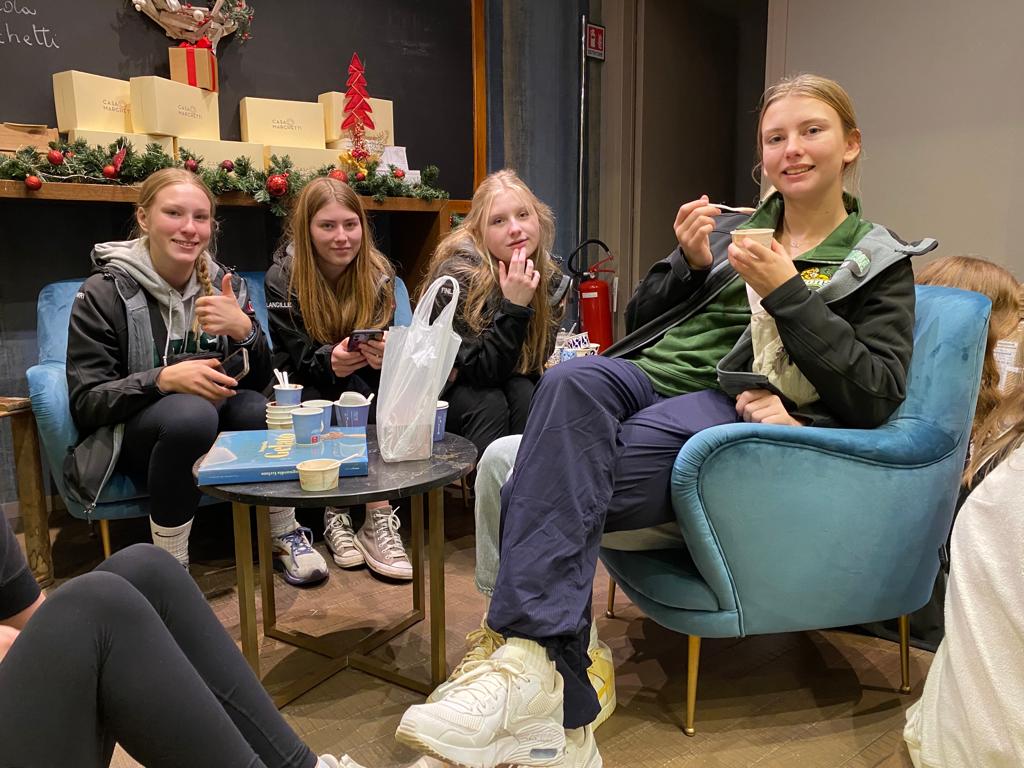 a group of people sitting at a table
