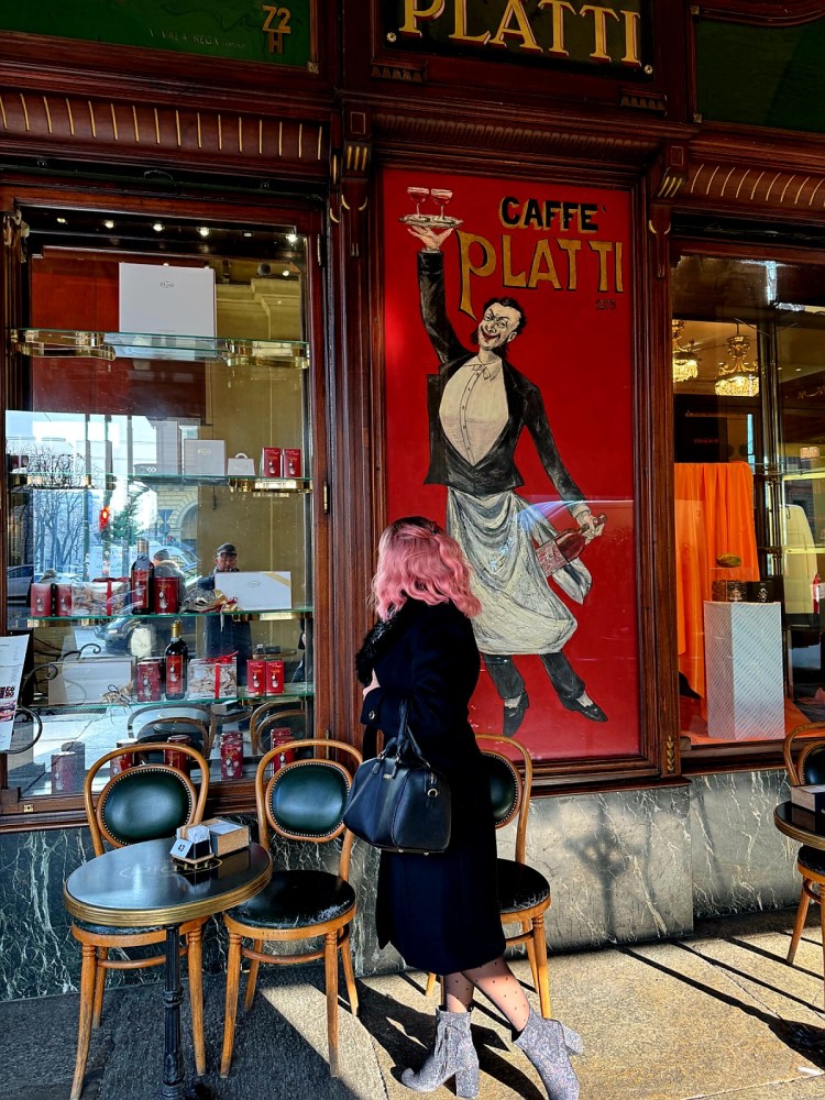 a person standing in front of a store