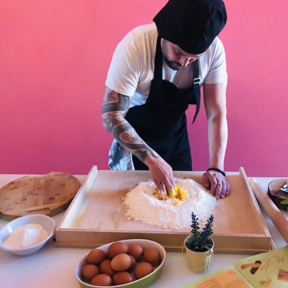 a person preparing food on a table