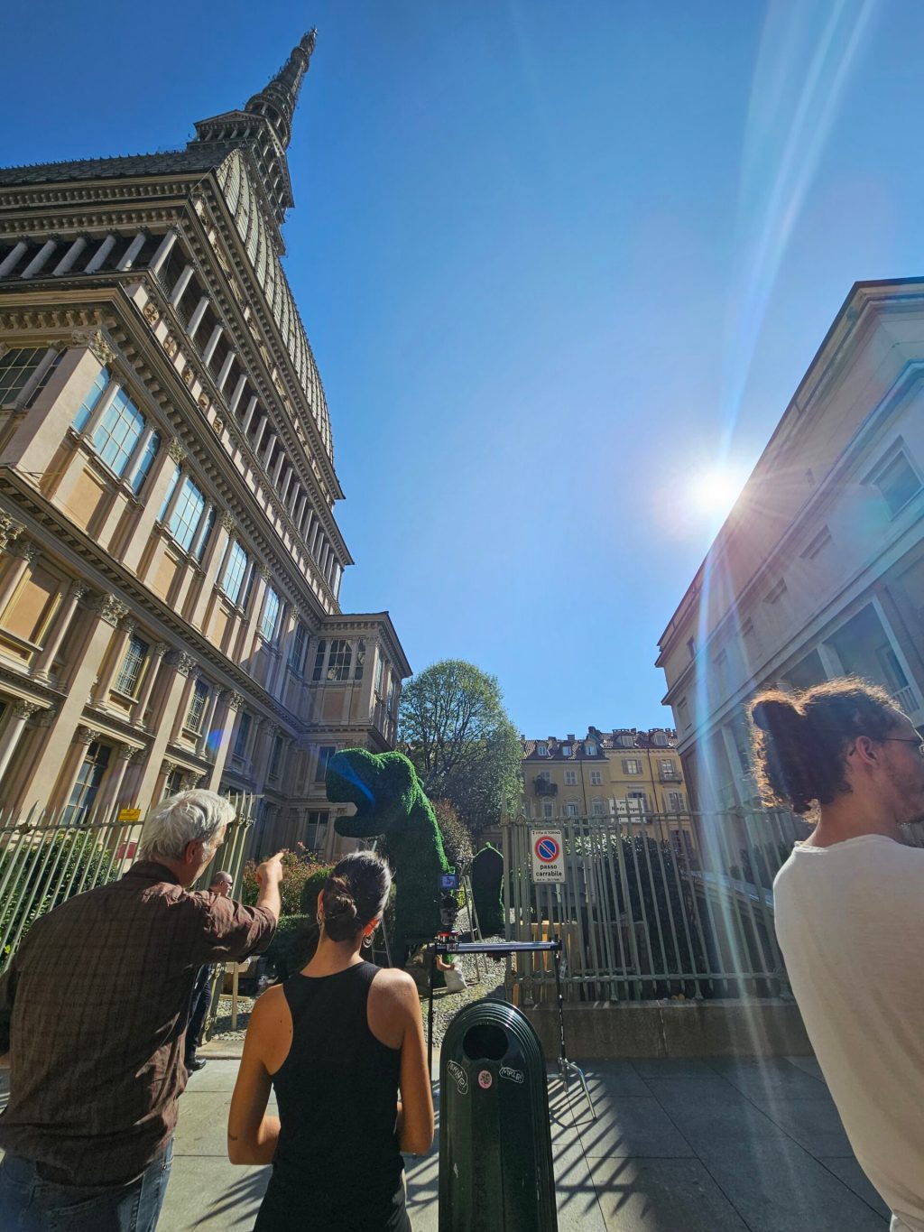 a group of people standing in front of a building
