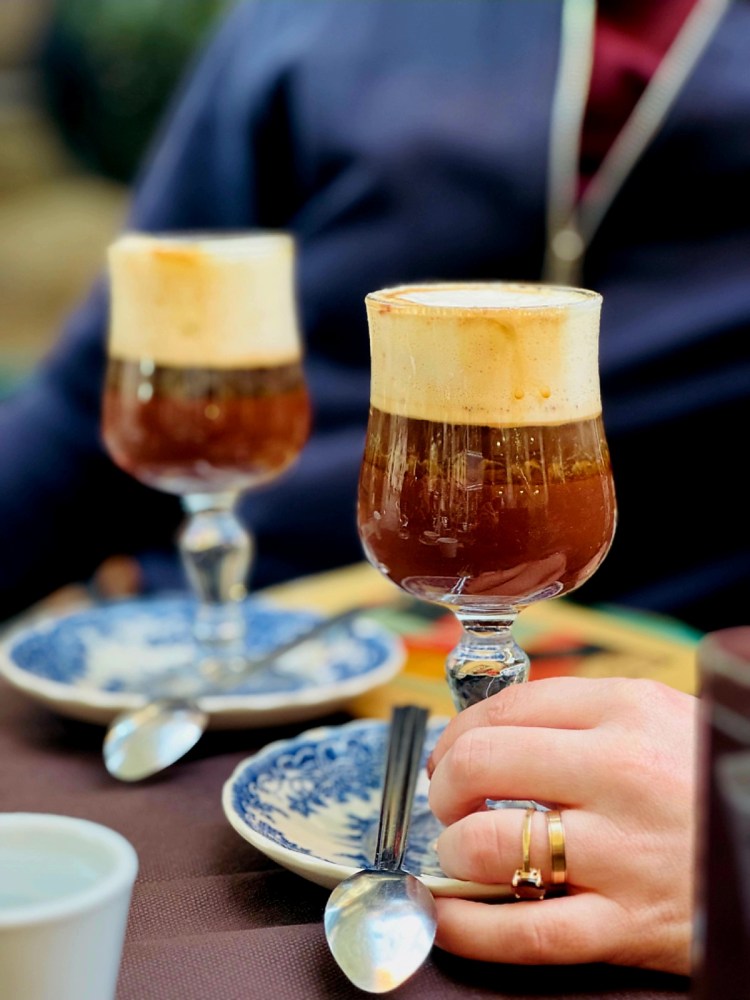 a cup of coffee on a table