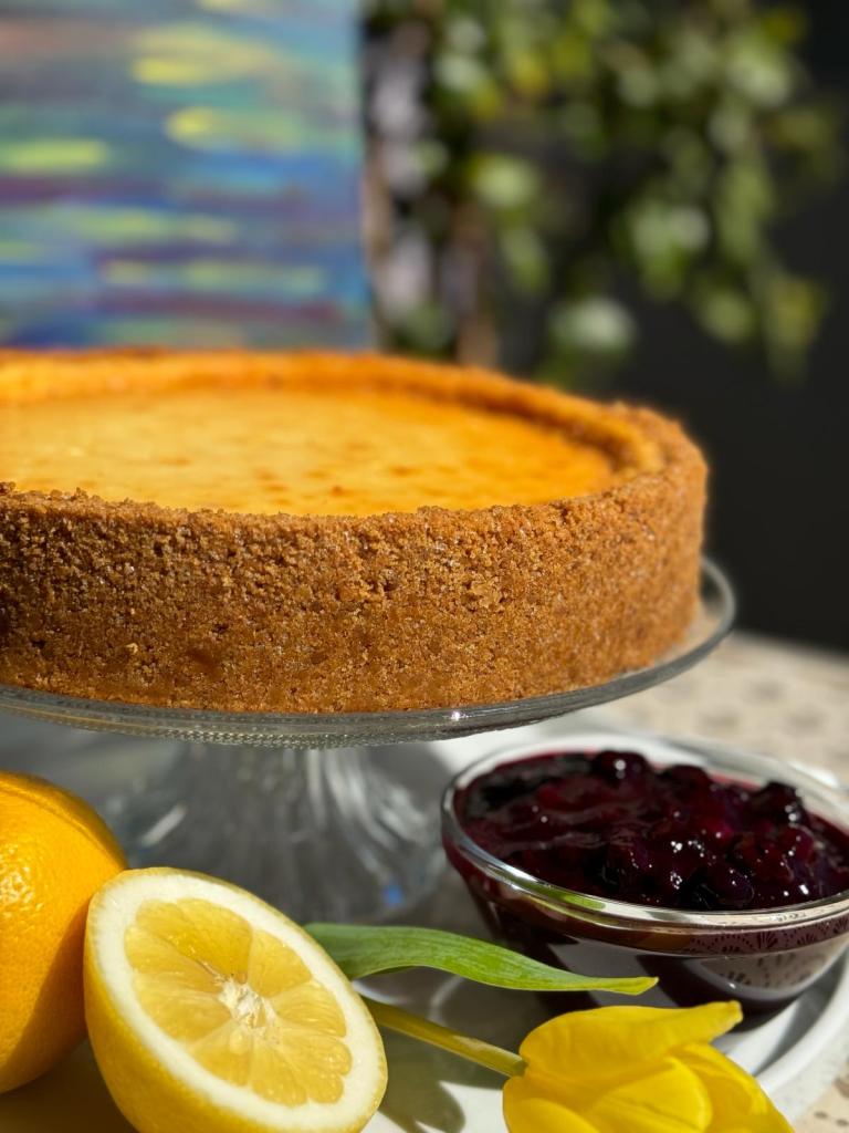 a close up of a bowl of oranges on a plate