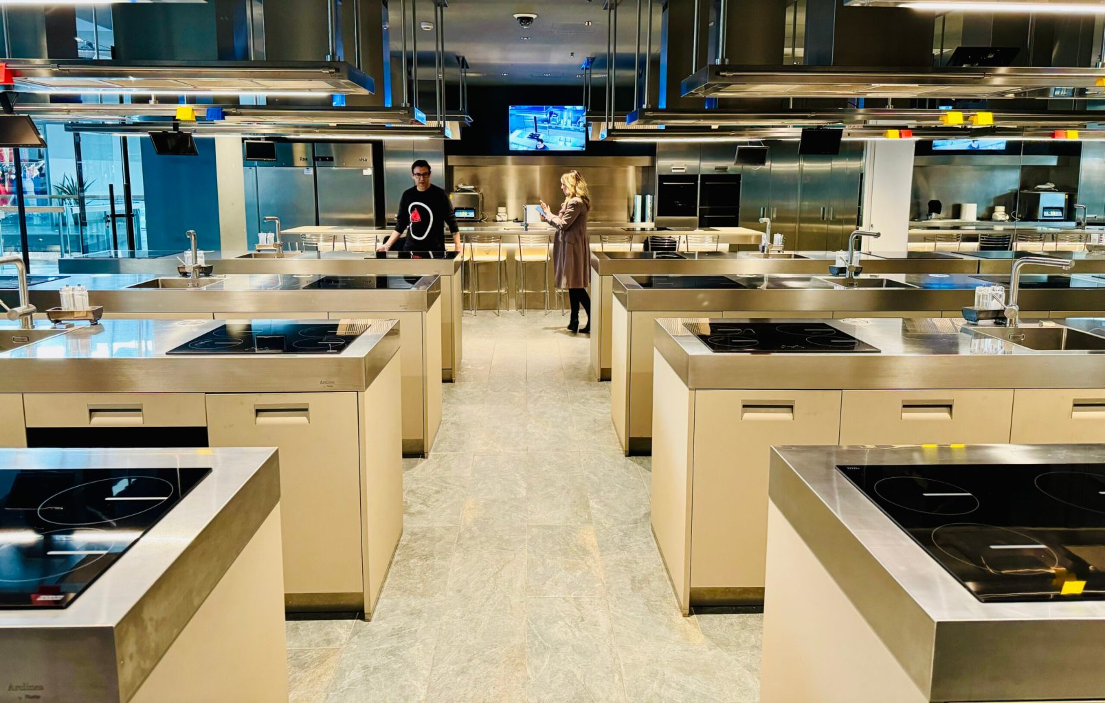 a stove top oven sitting inside of a kitchen