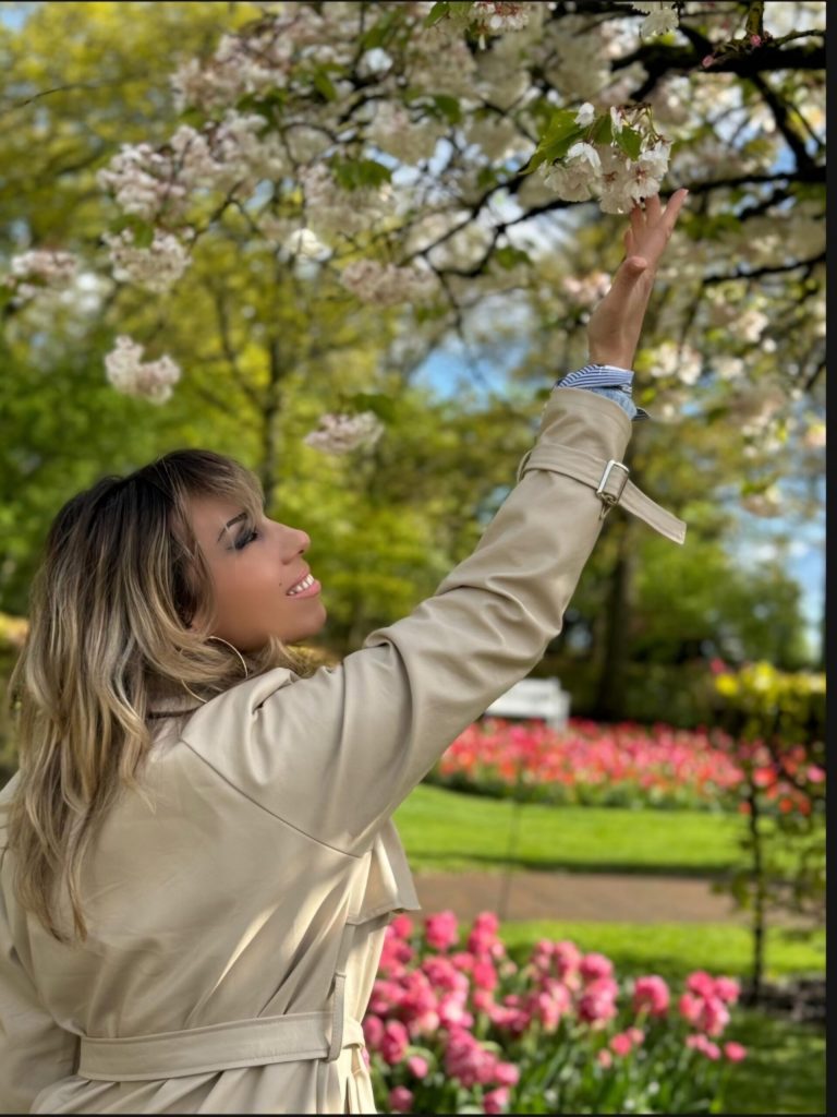 a person standing in front of a tree