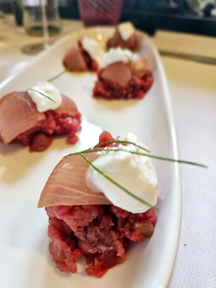 a plate of food with a slice cut out