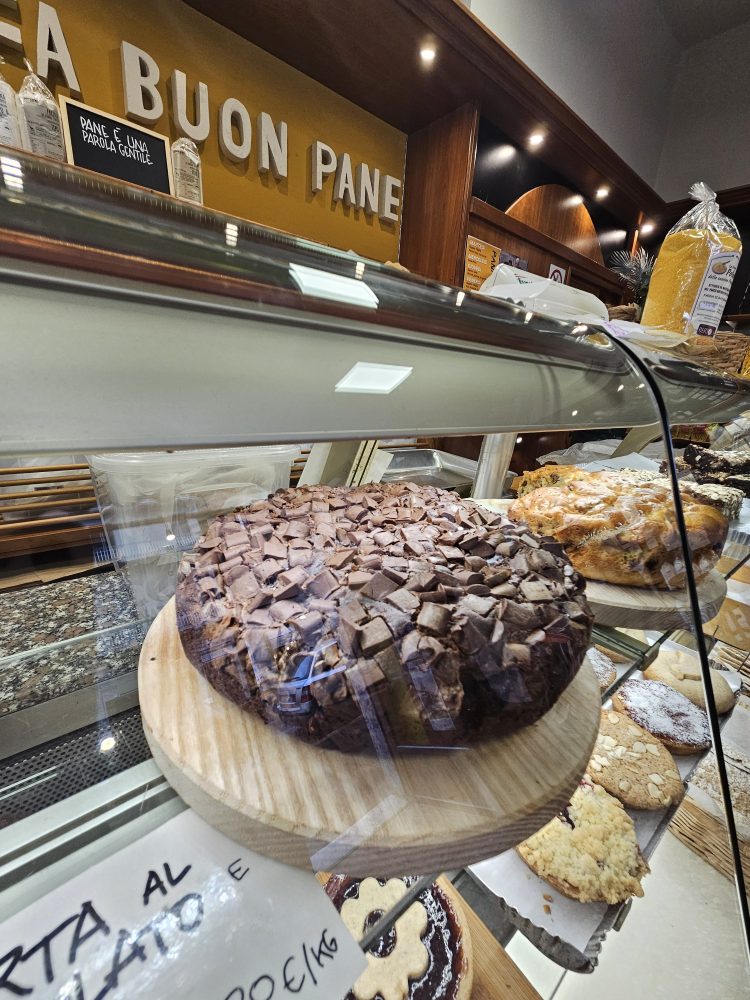 a glass display chocolate cakes