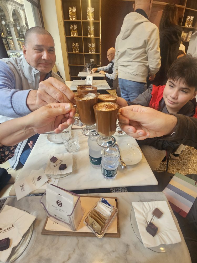 a group of people sitting at a table