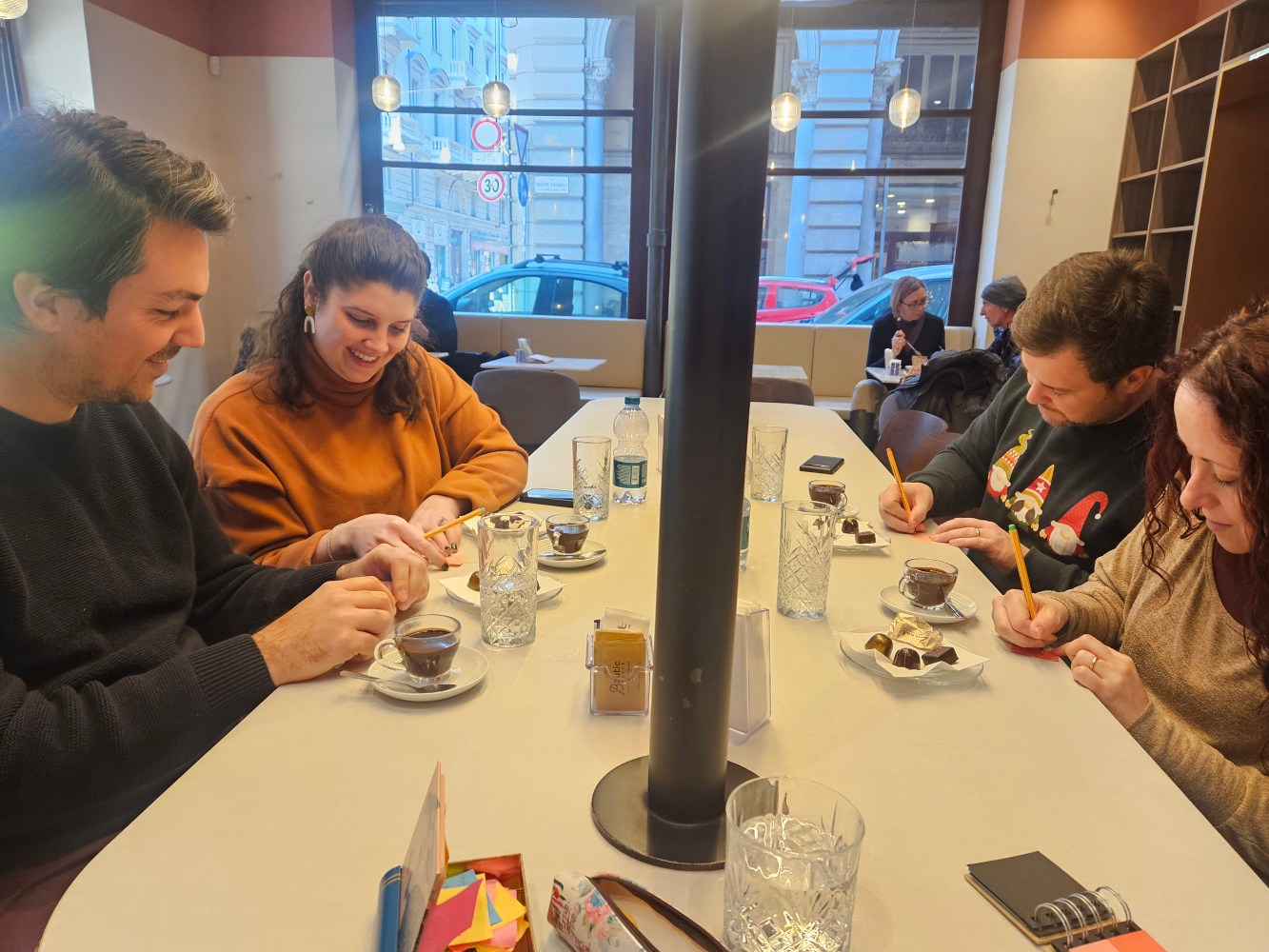 a group of people sitting at a table