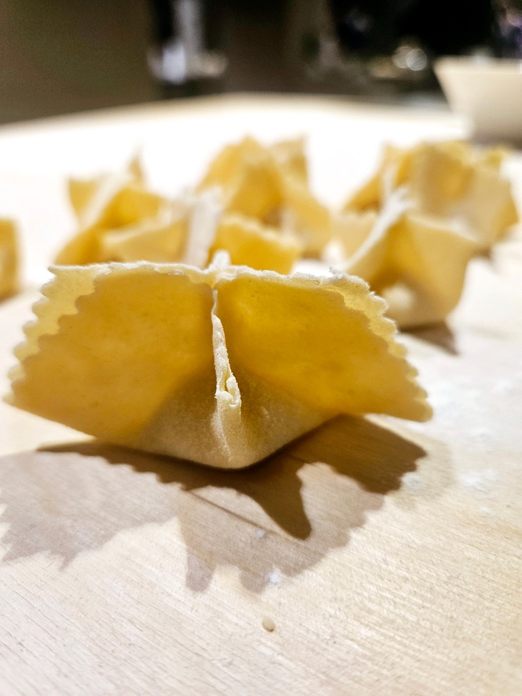 a piece of pasta on a plate